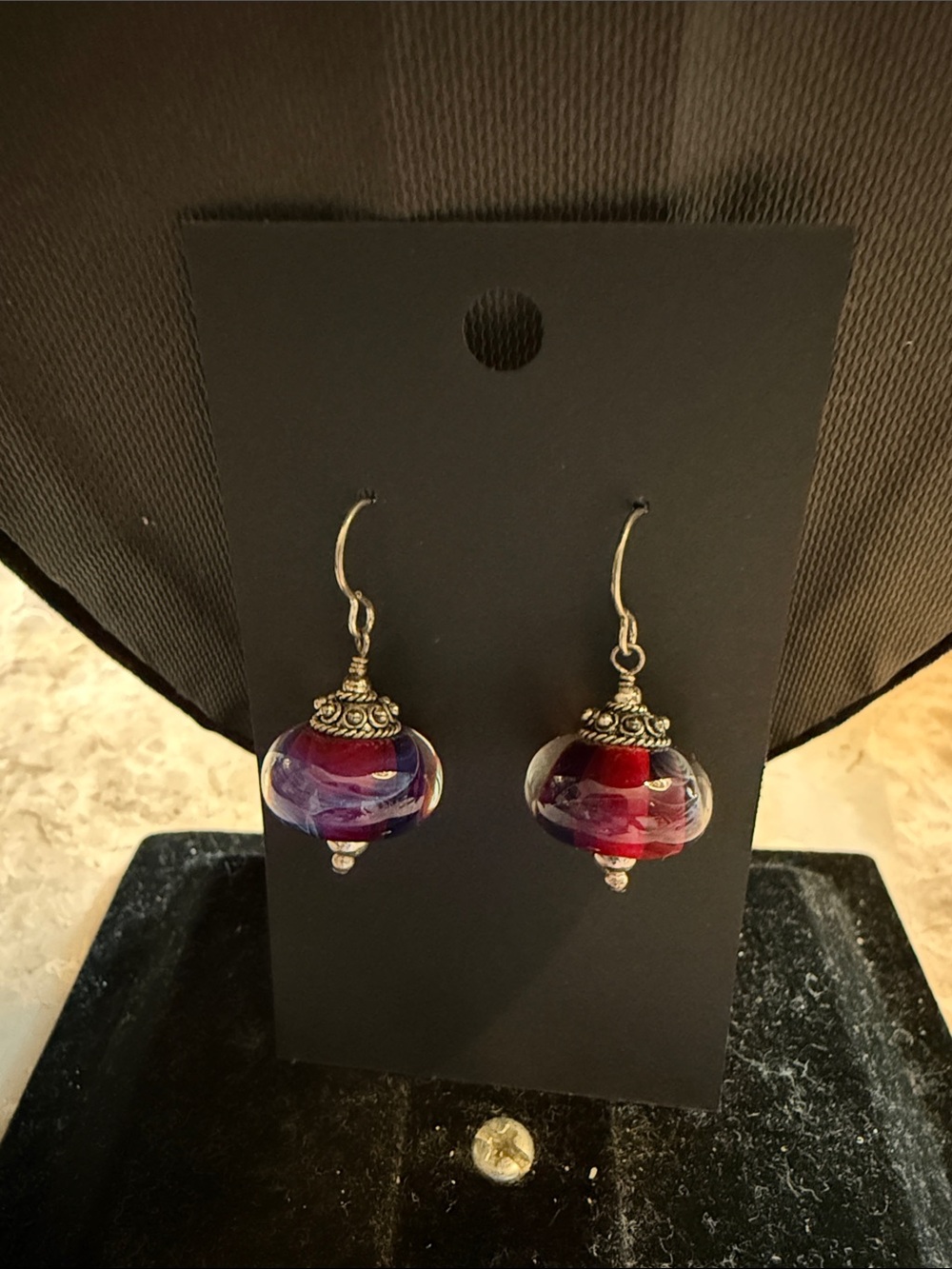 Artisan created lamp work, dark, purple and red glass sterling pierced earrings